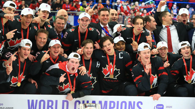 OSTRAVA, CZECH REPUBLIC - JANUARY 5, 2020: Canadian players and coaching staff pose for a group photograph during the medal ceremony for the 2020 World Junior Ice Hockey Championship final match between Canada and Russia at Ostravar Arena; Canada won 4-3. Peter Kovalev/TASS