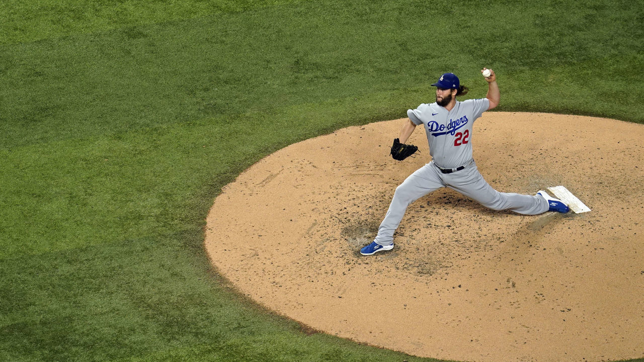 ARLINGTON, TX - OCTOBER 15: Clayton Kershaw #22 of the Los Angeles Dodgers pitches during Game 4 of the NLCS between the Atlanta Braves and the Los Angeles Dodgers at Globe Life Field on Thursday, October 15, 2020 in Arlington, Texas.
