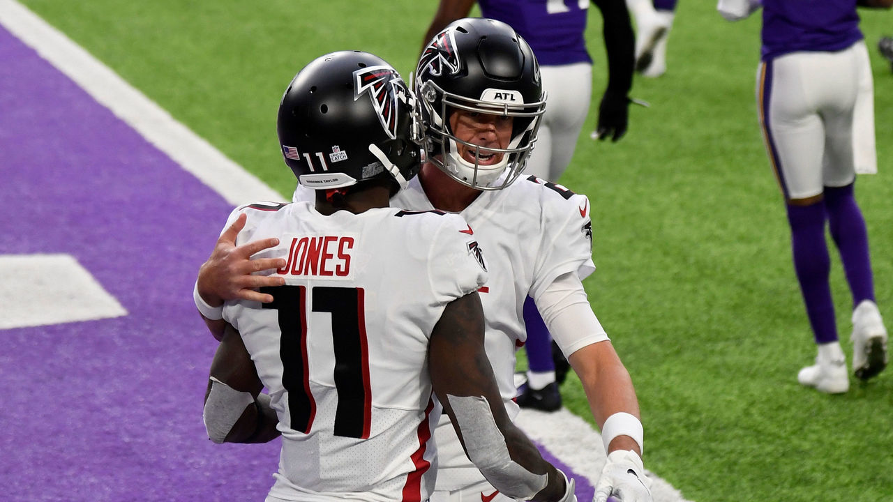 MINNEAPOLIS, MINNESOTA - OCTOBER 18: Julio Jones #11 and Matt Ryan #2 of the Atlanta Falcons celebrate after scoring a touchdown in the first quarter against the Minnesota Vikings at U.S. Bank Stadium on October 18, 2020 in Minneapolis, Minnesota.