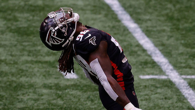 ATLANTA, GEORGIA - SEPTEMBER 13: Takkarist McKinley #98 of the Atlanta Falcons reacts after sacking Russell Wilson #3 of the Seattle Seahawks in the first half at Mercedes-Benz Stadium on September 13, 2020 in Atlanta, Georgia.