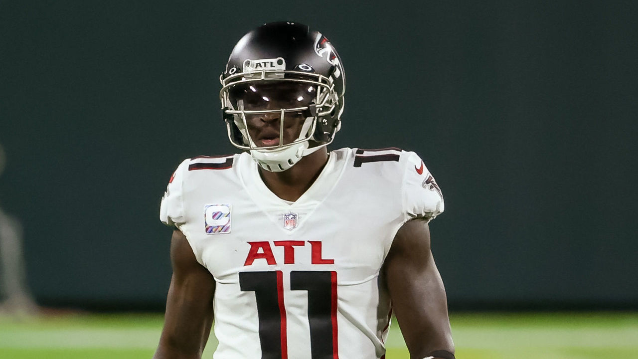 GREEN BAY, WISCONSIN - OCTOBER 05: Julio Jones #11 of the Atlanta Falcons walks across the field in the second quarter against the Green Bay Packers at Lambeau Field on October 05, 2020 in Green Bay, Wisconsin.