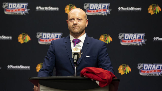 CHICAGO, ILLINOIS - OCTOBER 06: Vice president and general manager Stan Bowman of the Chicago Blackhawks speaks from the podium before their 17th overall pick in the first round of the 2020 NHL Entry Draft at Fifth Third Arena on October 06, 2020 in Chicago, Illinois. The 2020 NHL Draft was held virtually due to the ongoing Coronavirus pandemic.