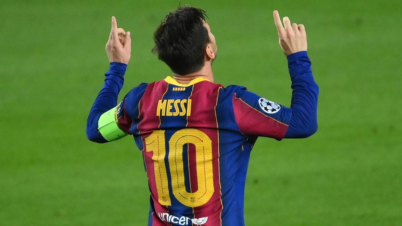 Barcelona's Argentine forward Lionel Messi celebrates after scoring a penalty during the UEFA Champions League football match between FC Barcelona and Ferencvarosi TC at the Camp Nou stadium in Barcelona on October 20, 2020.