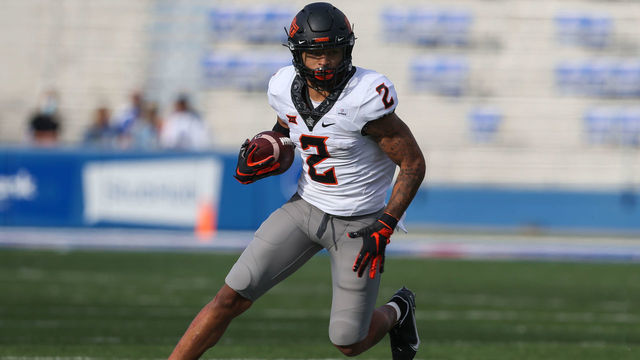 LAWRENCE, KS - OCTOBER 03: Oklahoma State Cowboys wide receiver Tylan Wallace (2) runs after the catch in the third quarter of a Big 12 football game between the Oklahoma State Cowboys and Kansas Jayhawks on October 3, 2020 at Memorial Stadium in Lawrence, KS.