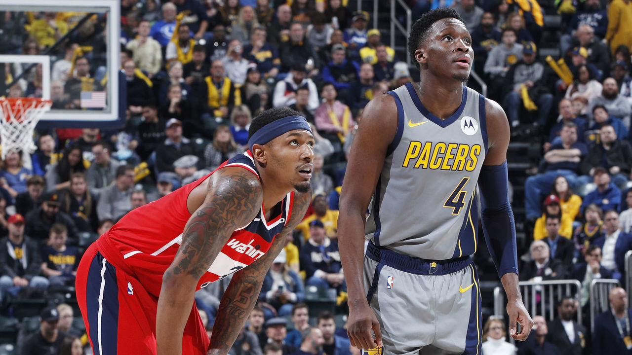 INDIANAPOLIS, IN - DECEMBER 23: Bradley Beal #3 of the Washington Wizards looks on alongside Victor Oladipo #4 of the Indiana Pacers during the game at Bankers Life Fieldhouse on December 23, 2018 in Indianapolis, Indiana. The Pacers won 105-89. NOTE TO USER: User expressly acknowledges and agrees that, by downloading and or using the photograph, User is consenting to the terms and conditions of the Getty Images License Agreement.