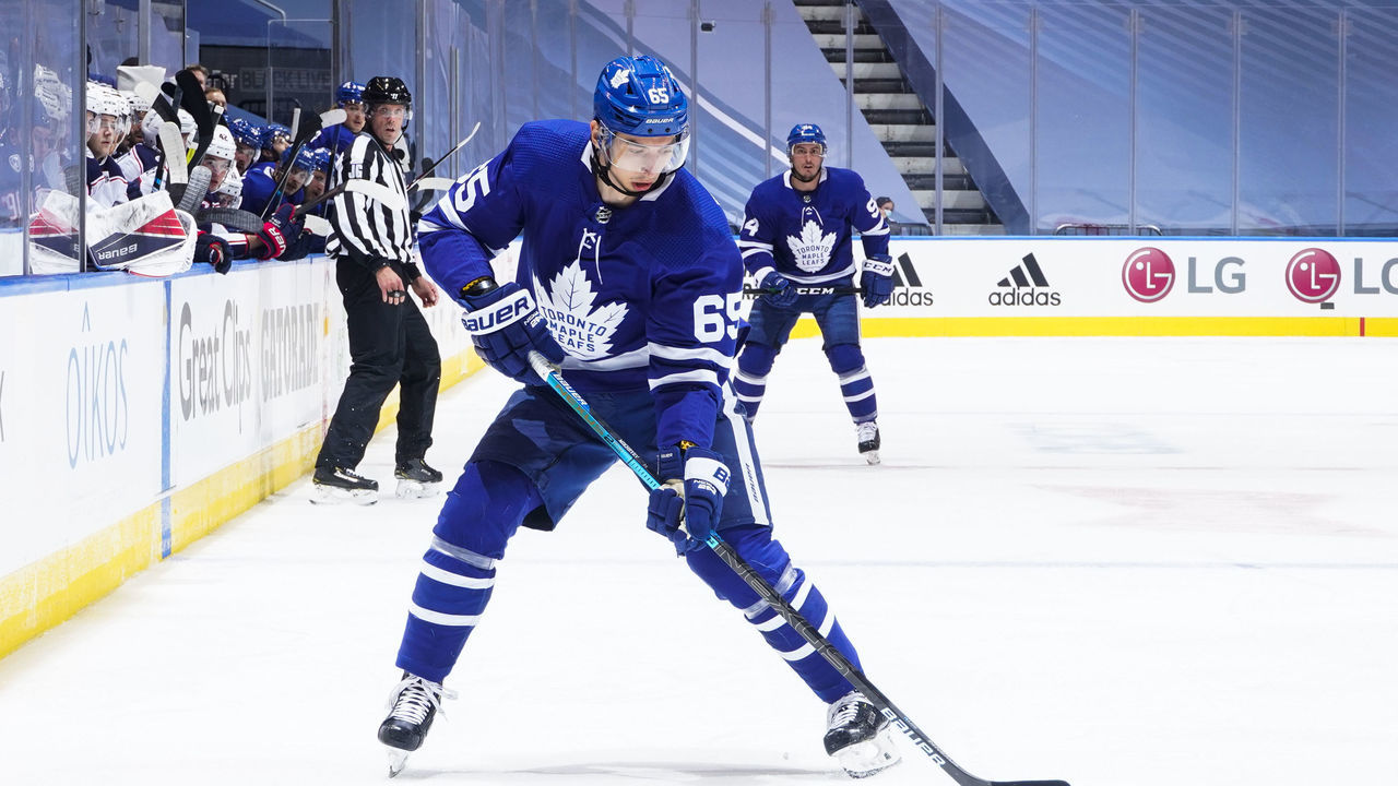 TORONTO, ONTARIO - AUGUST 02: Ilya Mikheyev #65 of the Toronto Maple Leafs plays the puck against the Columbus Blue Jackets during the first period in Game One of the Eastern Conference Qualification Round at Scotiabank Arena on August 02, 2020 in Toronto, Ontario.