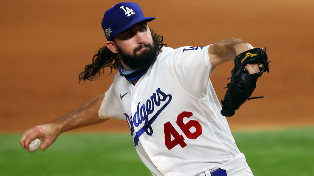 ARLINGTON, TEXAS - OCTOBER 18: Tony Gonsolin #46 of the Los Angeles Dodgers delivers the pitch against the Atlanta Braves during the second inning in Game Seven of the National League Championship Series at Globe Life Field on October 18, 2020 in Arlington, Texas.