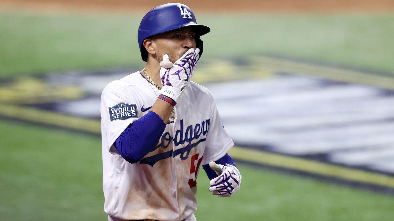 ARLINGTON, TEXAS - OCTOBER 20: Mookie Betts #50 of the Los Angeles Dodgers celebrates after hitting a solo home run against the Tampa Bay Rays during the sixth inning in Game One of the 2020 MLB World Series at Globe Life Field on October 20, 2020 in Arlington, Texas.