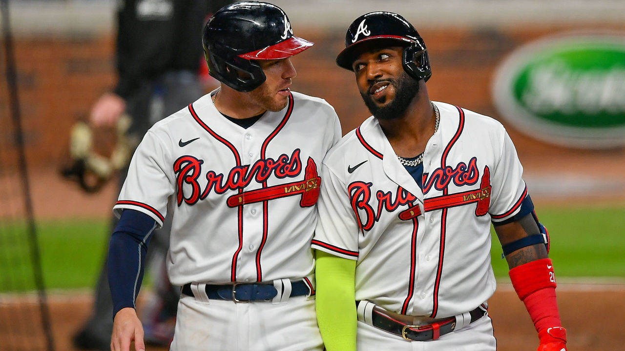 ATLANTA, GA SEPTEMBER 22: Atlanta Braves designated hitter Marcell Ozuna (right) talks with teammate Freddie Freeman (left) after hitting his second home run of the night during the MLB game between the Miami Marlins and the Atlanta Braves on September 22nd, 2020 at Truist Park in Atlanta, GA.