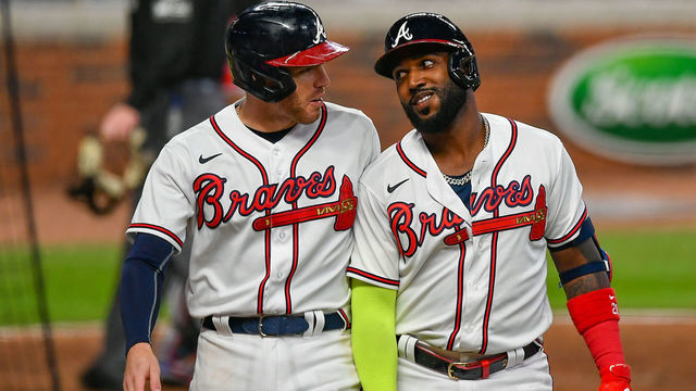 ATLANTA, GA SEPTEMBER 22: Atlanta Braves designated hitter Marcell Ozuna (right) talks with teammate Freddie Freeman (left) after hitting his second home run of the night during the MLB game between the Miami Marlins and the Atlanta Braves on September 22nd, 2020 at Truist Park in Atlanta, GA.