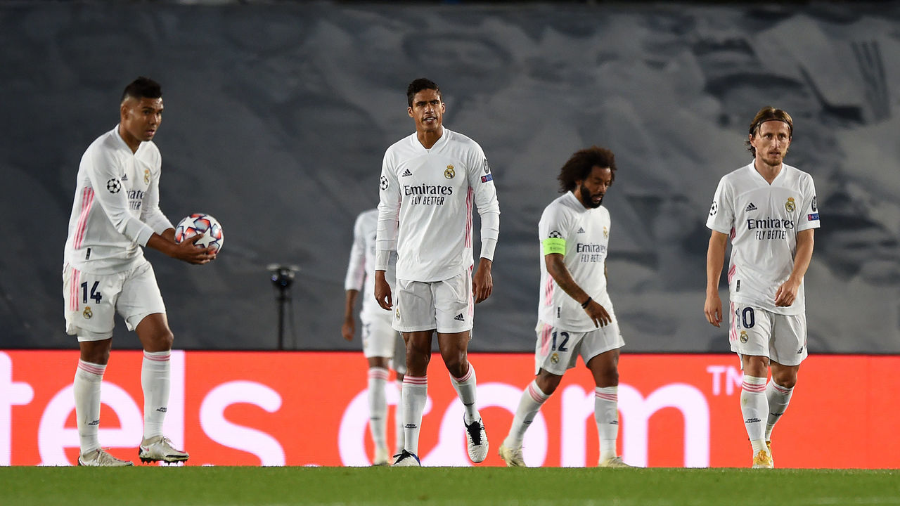 MADRID, SPAIN - OCTOBER 21: Marcelo, Raphael Varane and Luka Modric of Real Madrid look dejected after conceding a third goal during the UEFA Champions League Group B stage match between Real Madrid and Shakhtar Donetsk at Estadio Alfredo Di Stefano on October 21, 2020 in Madrid, Spain. The game will be played behind closed doors as a COVID-19 precaution.