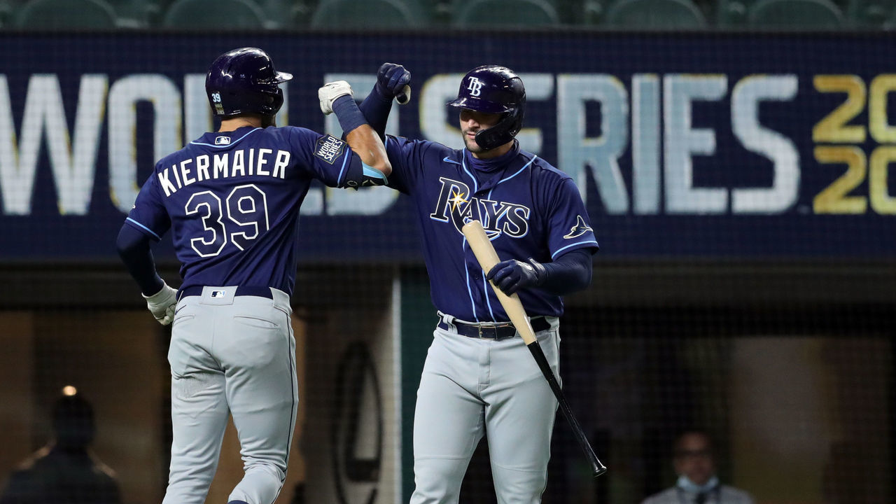 ARLINGTON, TX - OCTOBER 20: Kevin Kiermaier #39 of the Tampa Bay Rays is congratulated by Mike Zunino #10 after hitting a home run in the fifth inning during Game 1 of the 2020 World Series between the Los Angeles Dodgers and the Tampa Bay Rays at Globe Life Field on Tuesday, October 20, 2020 in Arlington, Texas.
