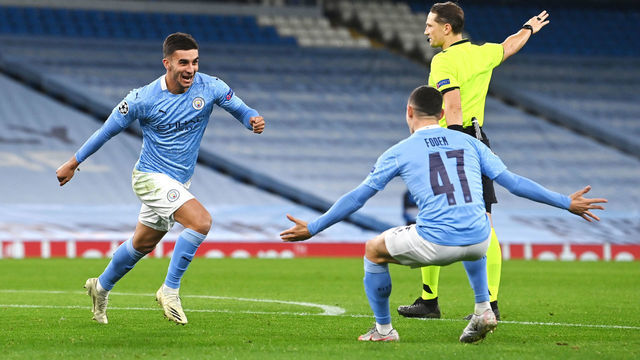 Manchester City's Ferran Torres (left) celebrates scoring his side's third goal of the game with Phil Foden during the UEFA Champions League Group C match at the Etihad Stadium, Manchester.