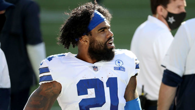 SEATTLE, WASHINGTON - SEPTEMBER 27: Ezekiel Elliott #21 of the Dallas Cowboys looks on against the Seattle Seahawks during the third quarter in the game at CenturyLink Field on September 27, 2020 in Seattle, Washington.