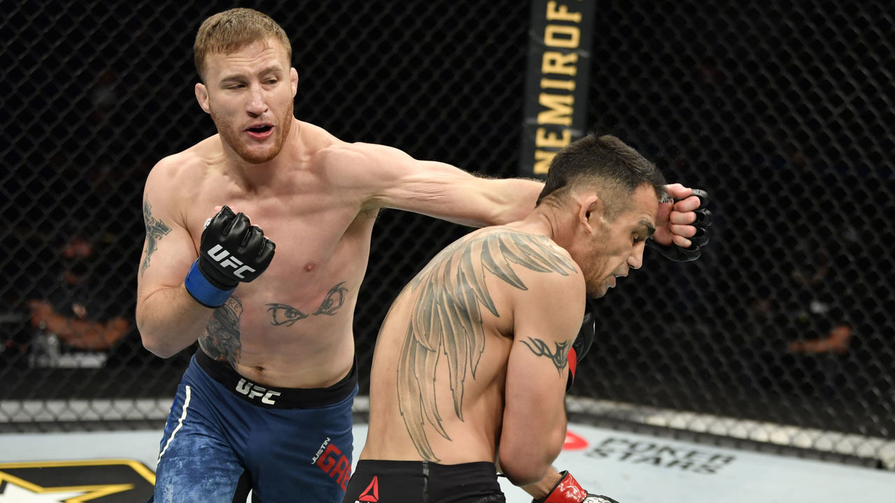 JACKSONVILLE, FLORIDA - MAY 09: (L-R) Justin Gaethje punches Tony Ferguson in their UFC interim lightweight championship fight during the UFC 249 event at VyStar Veterans Memorial Arena on May 09, 2020 in Jacksonville, Florida.