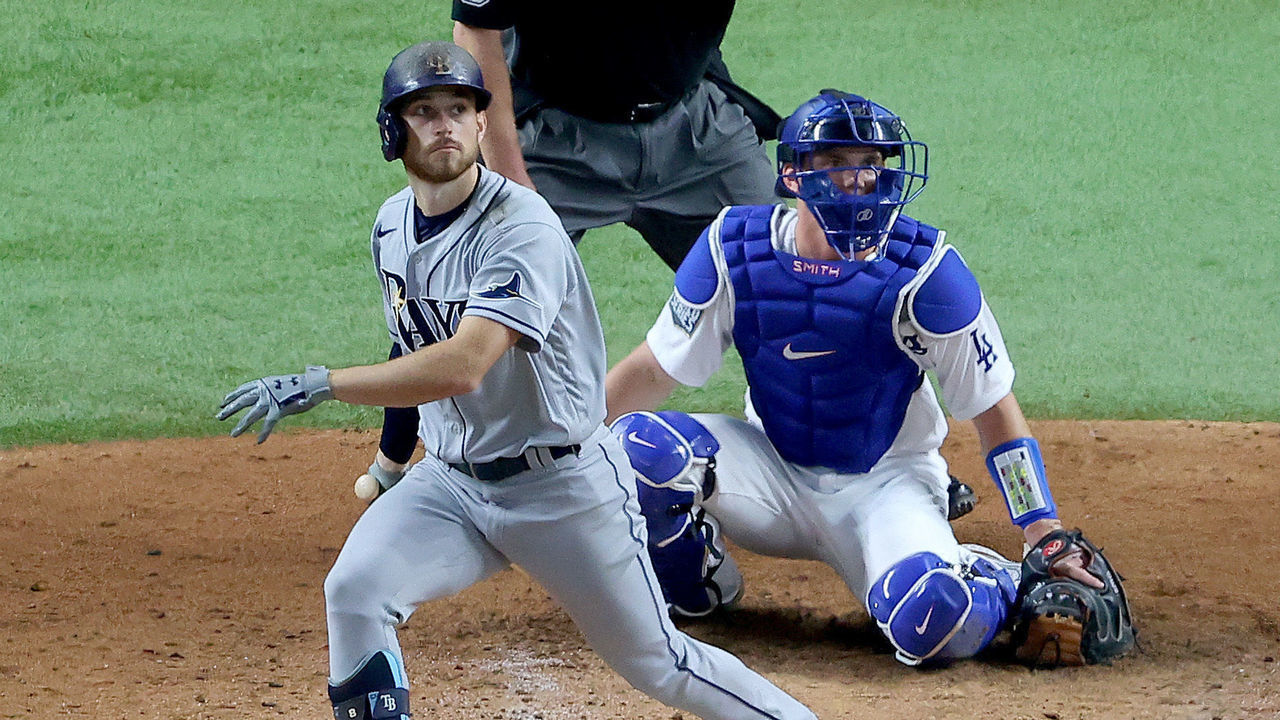 ARLINGTON, TEXAS - OCTOBER 21: Brandon Lowe #8 of the Tampa Bay Rays hits a two run home run against the Los Angeles Dodgers during the fifth inning in Game Two of the 2020 MLB World Series at Globe Life Field on October 21, 2020 in Arlington, Texas.