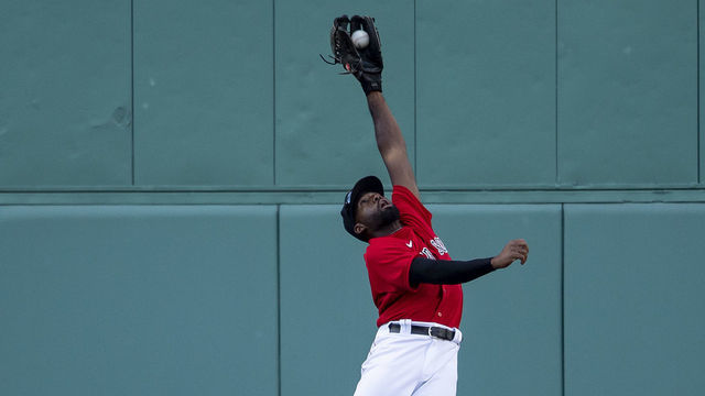 BOSTON, MA - SEPTEMBER 4: Jackie Bradley Jr. #19 of the Boston Red Sox makes a leaping catch during the sixth inning of a game against the Toronto Blue Jays on September 4, 2020 at Fenway Park in Boston, Massachusetts. The 2020 season had been postponed since March due to the COVID-19 pandemic.