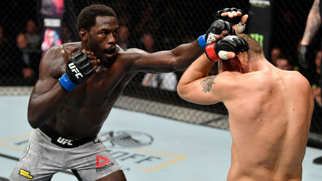 COPENHAGEN, DENMARK - SEPTEMBER 28: (L-R) Jared Cannonier punches Jack Hermansson of Sweden in their middleweight bout during the UFC Fight Night event at Royal Arena on September 28, 2019 in Copenhagen, Denmark.