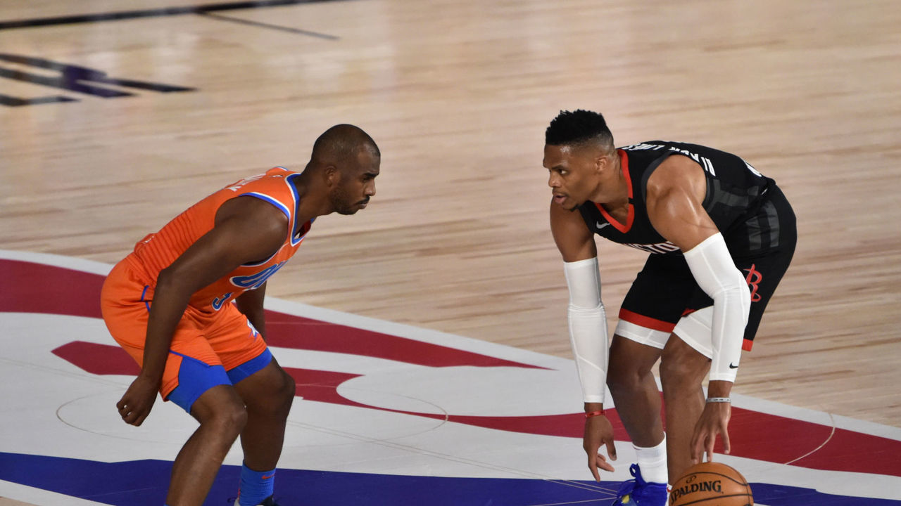 ORLANDO, FL - AUGUST 29: Russell Westbrook #0 of the Houston Rockets looks to drive against Chris Paul #3 of the Oklahoma City Thunder for Game five of the first round of the 2020 Playoffs as part of the NBA Restart 2020 on August 29, 2020 at The Field House in Orlando, Florida. NOTE TO USER: User expressly acknowledges and agrees that, by downloading and/or using this photograph, user is consenting to the terms and conditions of the Getty Images License Agreement. Mandatory Copyright Notice: Copyright 2020 NBAE