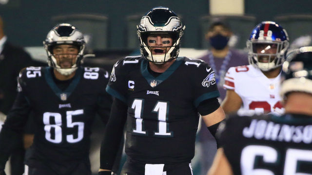 PHILADELPHIA, PA - OCTOBER 22: Carson Wentz #11 of the Philadelphia Eagles celebrates his touchdown score during the first quarter against the New York Giants at Lincoln Financial Field on October 22, 2020 in Philadelphia, Pennsylvania.