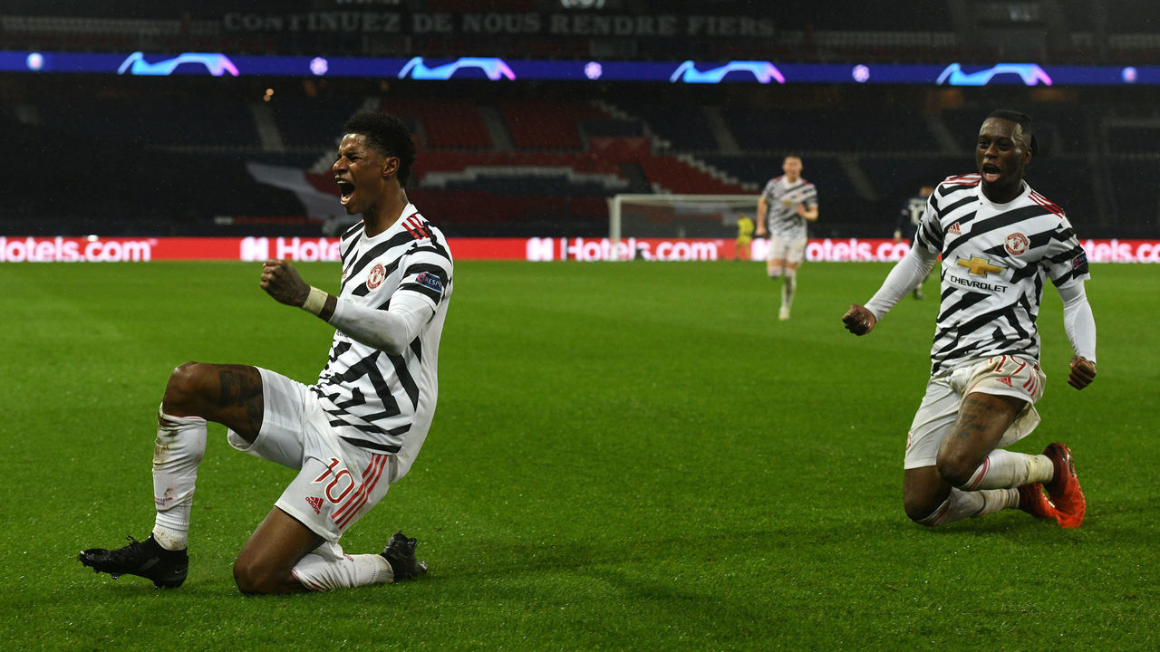 PARIS, FRANCE - OCTOBER 20: Marcus Rashford of Manchester United celebrates after scoring his sides second goal during the UEFA Champions League Group H stage match between Paris Saint-Germain and Manchester United at Parc des Princes on October 20, 2020 in Paris, France. Sporting stadiums around Europe remain under strict restrictions due to the Coronavirus Pandemic as Government social distancing laws prohibit fans inside venues resulting in games being played behind closed doors.