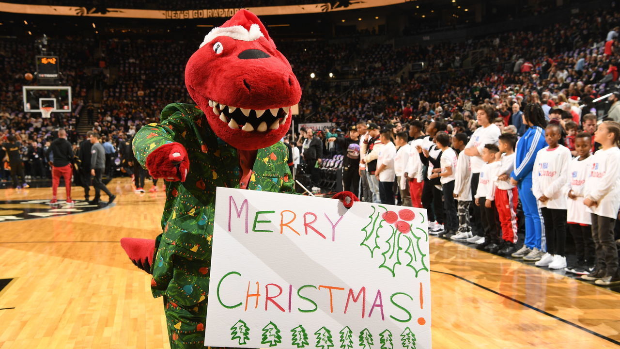 TORONTO, CANADA - DECEMBER 25: The Toronto Raptor wishes everyone a Merry Christmas during the game between the Toronto Raptors and the Boston Celtics on December 25, 2019 at the Scotiabank Arena in Toronto, Ontario, Canada. Mandatory Copyright Notice: Copyright 2019 NBAE