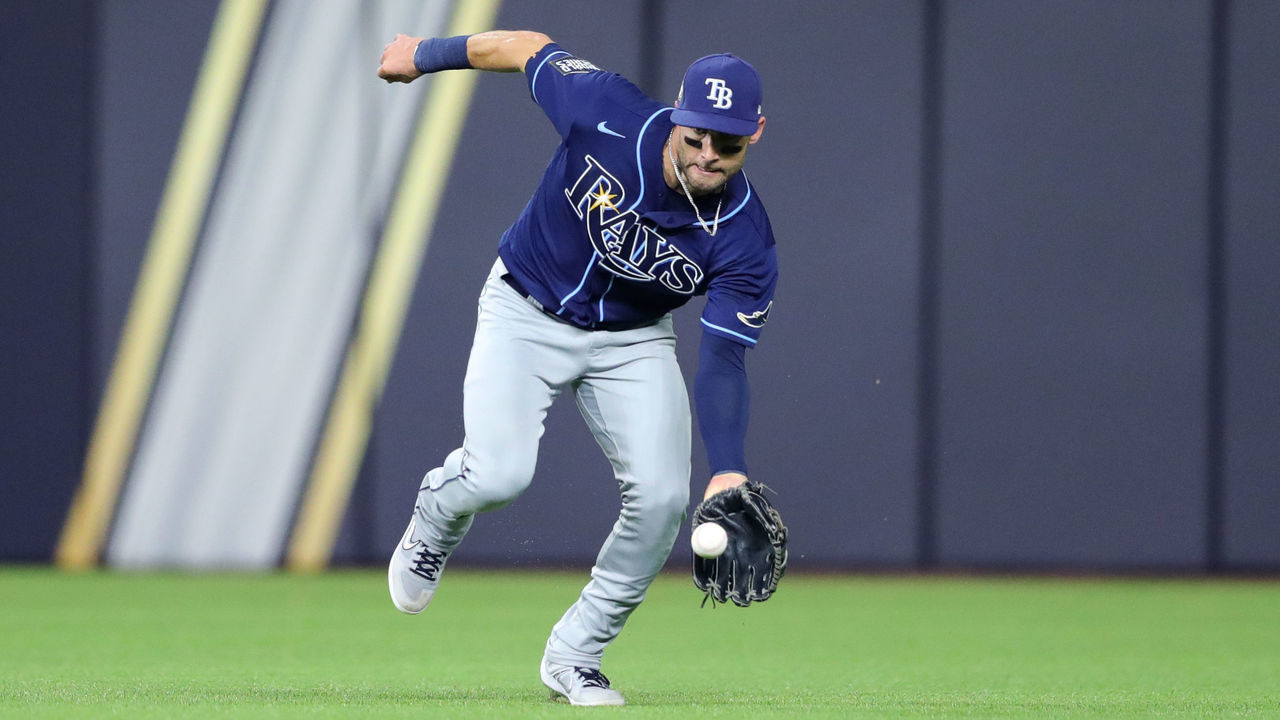 ARLINGTON, TX - OCTOBER 20: Kevin Kiermaier #39 of the Tampa Bay Rays fields the ball in the eighth inning during Game 1 of the 2020 World Series between the Los Angeles Dodgers and the Tampa Bay Rays at Globe Life Field on Tuesday, October 20, 2020 in Arlington, Texas.