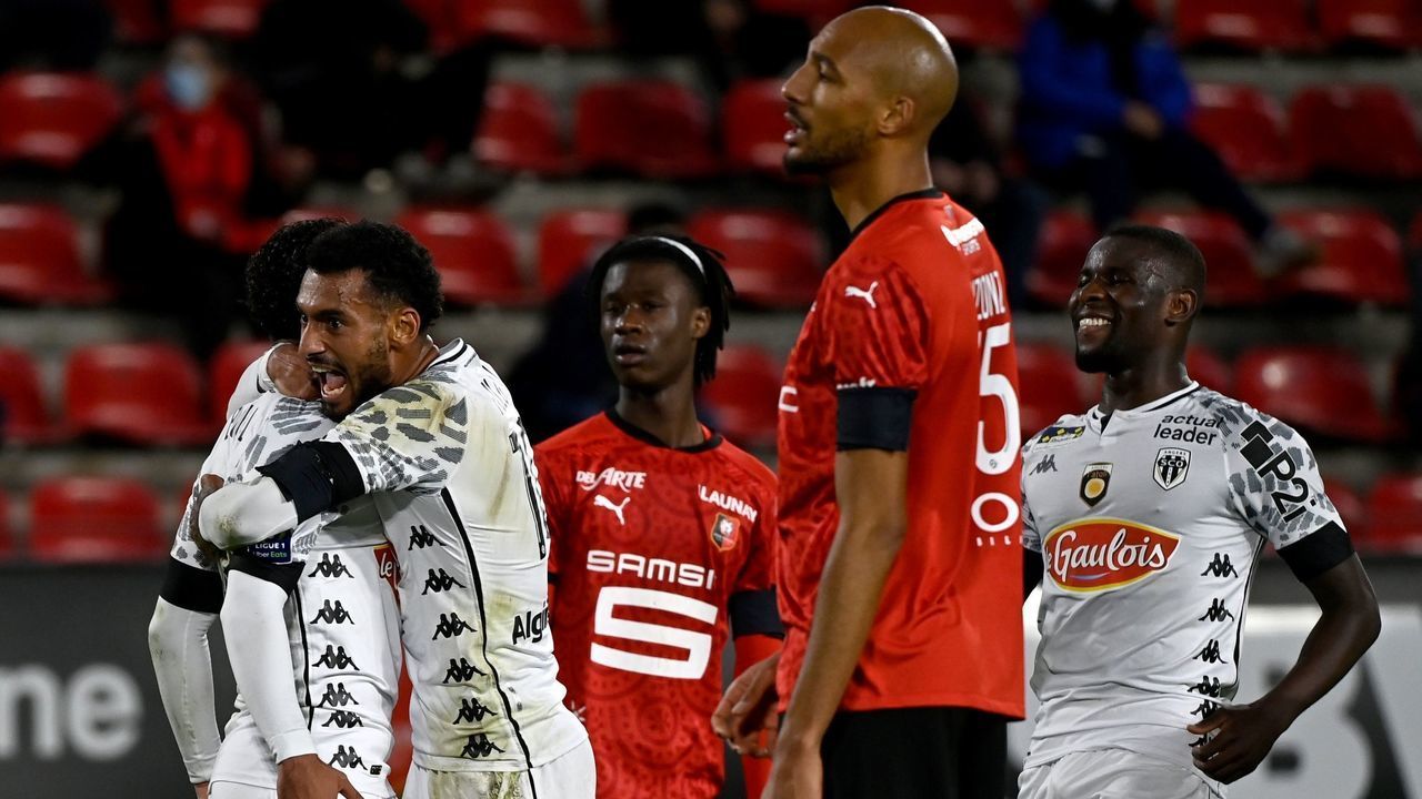 Angers' players celebrate after scoring a goal during the French L1 football match between Stade Rennais and Angers, at the Roazhon Park stadium in Rennes, northwestern France on October 23, 2020.
