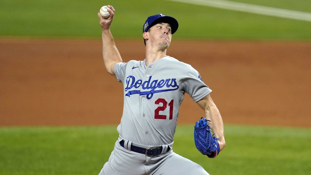 ARLINGTON, TX - OCTOBER 23: Walker Buehler #21 of the Los Angeles Dodgers pitches during Game 3 of the 2020 World Series between the Los Angeles Dodgers and the Tampa Bay Rays at Globe Life Field on Friday, October 23, 2020 in Arlington, Texas.