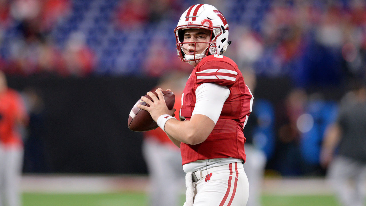 INDIANAPOLIS, IN - DECEMBER 07: Wisconsin Badgers quarterback Graham Mertz (5) warms up for the Big Ten Conference Championship football game between the Wisconsin Badgers and the Ohio State Buckeyes on December 7, 2019, at Lucas Oil Stadium in Indianapolis, Indiana.