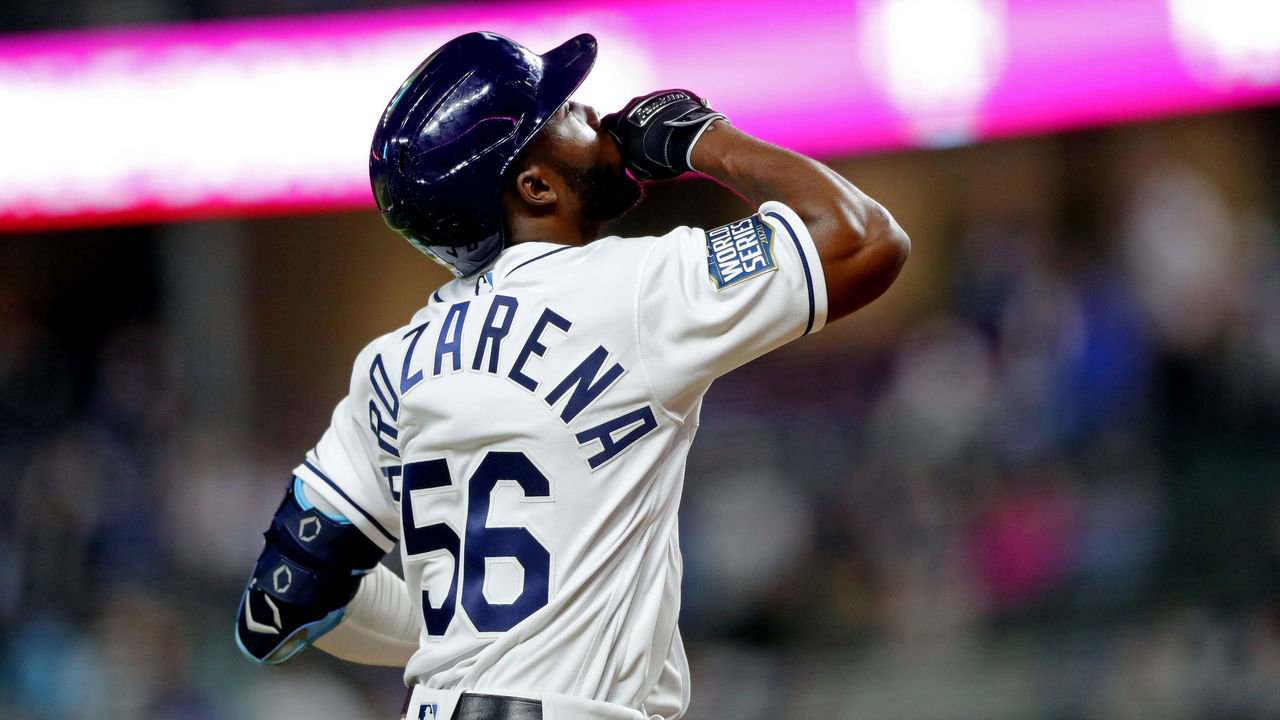ARLINGTON, TX - OCTOBER 23: Randy Arozarena #56 of the Tampa Bay Rays looks to the sky as he touches home plate after hitting a solo home run in the ninth inning during Game 3 of the 2020 World Series between the Los Angeles Dodgers and the Tampa Bay Rays at Globe Life Field on Friday, October 23, 2020 in Arlington, Texas.