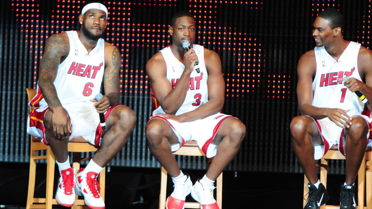 (L-R) LeBron James, Dwyane Wade and Chris Bosh attend HEAT Summer of 2010 Welcome Event at AmericanAirlines Arena on July 9, 2010 in Miami, Florida.