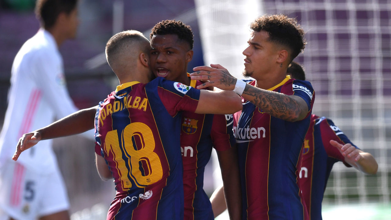 BARCELONA, SPAIN - OCTOBER 24: Ansu Fati of Barcelona celebrates after he scores his team's first goal during the La Liga Santander match between FC Barcelona and Real Madrid at Camp Nou on October 24, 2020 in Barcelona, Spain. Sporting stadiums around Spain remain under strict restrictions due to the Coronavirus Pandemic as Government social distancing laws prohibit fans inside venues resulting in games being played behind closed doors.