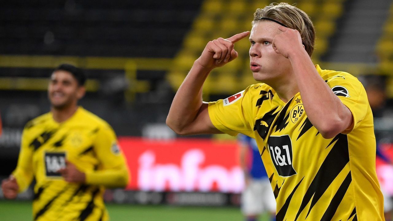 Dortmund's Norwegian forward Erling Braut Haaland celebrates scoring the 2-0 goal during the German first division Bundesliga football match between BVB Borussia Dortmund v Schalke 04 on October 24, 2020 in Dortmund, western Germany.