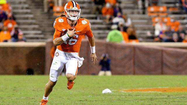 CLEMSON, SC - OCTOBER 03: Clemson Tigers quarterback Trevor Lawrence (16) scrambles down field on the quarterback keeper during the game between the Clemson Tigers and the Virginia Cavaliers on October 03, 2020 at Memorial Stadium in Clemson, South Carolina.