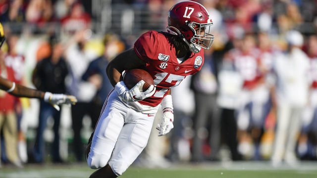 ORLANDO, FL - JANUARY 01: Alabama Crimson Tide wide receiver Jaylen Waddle (17) returns a punt during the second half of the Citrus Bowl between the Michigan Wolverines and the Alabama Crimson Tide on January 01, 2020, at Camping World Stadium in Orlando, FL.