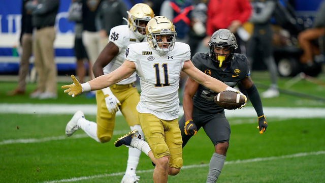 PITTSBURGH, PA - OCTOBER 24: Ben Skowronek #11 of the Notre Dame Fighting Irish reacts as he runs towards the end zone for a 34-yard touchdown reception in the first quarter during the game against the Pittsburgh Panthers at Heinz Field on October 24, 2020 in Pittsburgh, Pennsylvania.