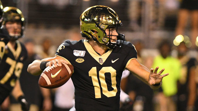WINSTON-SALEM, NC - OCTOBER 12: Wake Forest Demon Deacons quarterback Sam Hartman (10) pulls back to throw late in the fourth quarter against the Louisville Cardinals on October 12, 2019 at BB&T Field in Winston-Salem,NC.