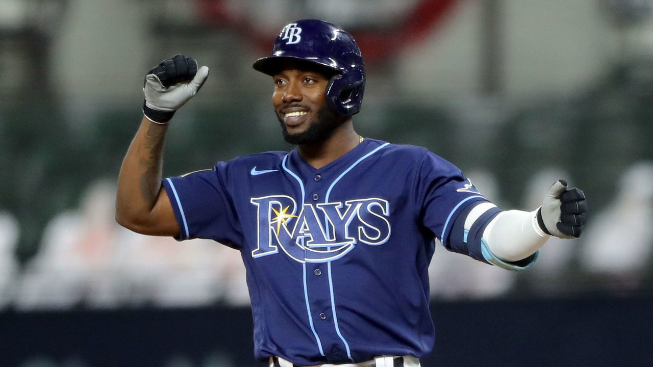 ARLINGTON, TX - OCTOBER 24: Randy Arozarena #56 of the Tampa Bay Rays reacts from first base after hitting a single in the first inning of Game 4 of the 2020 World Series between the Los Angeles Dodgers and the Tampa Bay Rays at Globe Life Field on Saturday, October 24, 2020 in Arlington, Texas.