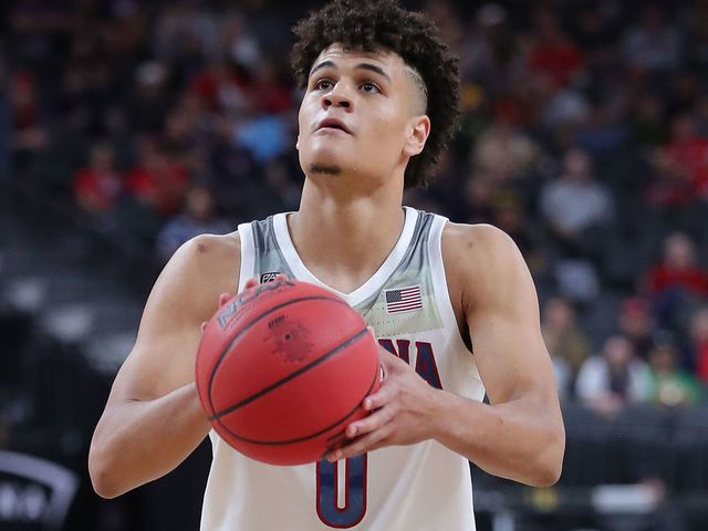 LAS VEGAS, NEVADA - MARCH 11: Josh Green #0 of the Arizona Wildcats shooting a free throw against the Washington Huskies during the first round of the Pac-12 Conference basketball tournament at T-Mobile Arena on March 11, 2020 in Las Vegas, Nevada.