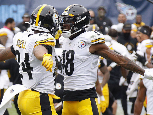 NASHVILLE, TENNESSEE - OCTOBER 25: Benny Snell #24 of the Pittsburgh Steelers is congratulated by teammate Diontae Johnson #18 after scoring a touchdown against the Tennessee Titans during the first half at Nissan Stadium on October 25, 2020 in Nashville, Tennessee.