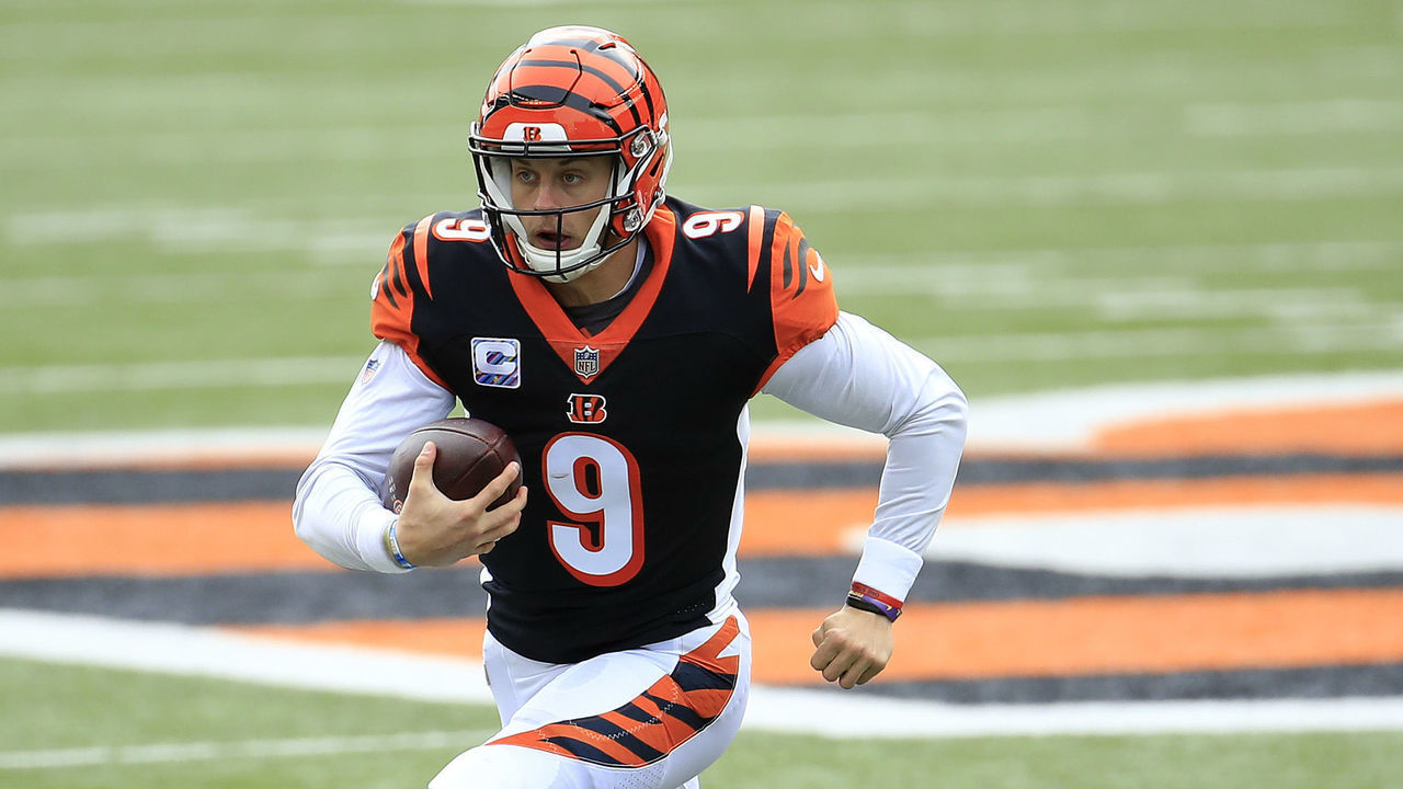 CINCINNATI, OHIO - OCTOBER 25: Joe Burrow #9 of the Cincinnati Bengals runs the ball against the Cleveland Browns during the first half at Paul Brown Stadium on October 25, 2020 in Cincinnati, Ohio.