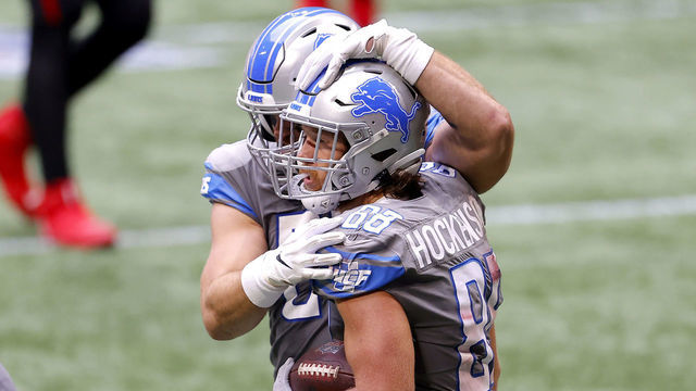 ATLANTA, GEORGIA - OCTOBER 25: Matthew Stafford #9 and T.J. Hockenson #88 of the Detroit Lions celebrate their touchdown against the Atlanta Falcons during the fourth quarter at Mercedes-Benz Stadium on October 25, 2020 in Atlanta, Georgia.