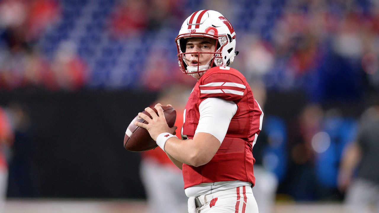 INDIANAPOLIS, IN - DECEMBER 07: Wisconsin Badgers quarterback Graham Mertz (5) warms up for the Big Ten Conference Championship football game between the Wisconsin Badgers and the Ohio State Buckeyes on December 7, 2019, at Lucas Oil Stadium in Indianapolis, Indiana.