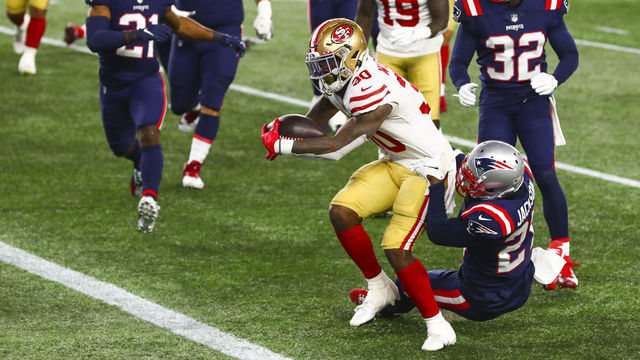 FOXBOROUGH, MASSACHUSETTS - OCTOBER 25: Jeff Wilson #30 of the San Francisco 49ers scores a touchdown in the third quarter of a game against the New England Patriots on October 25, 2020 in Foxborough, Massachusetts.