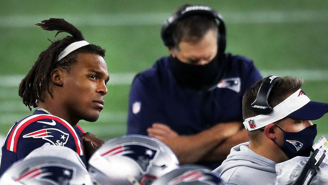 FOXBOROUGH, MA - OCTOBER 25: During the fourth quarter of the 49ers 33-6 victory, Patriots quarterback Cam Newton, left, stands on the sidelines after he was pulled from the game. Head coach Bill Belichick (center) and offensive coordinator Josh McDaniels (right) are also pictured. The New England Patriots host The San Francisco 49ers during a regular season NFL game on Sunday, Oct. 25, 2020 at Gillette Stadium in Foxborough, MA.