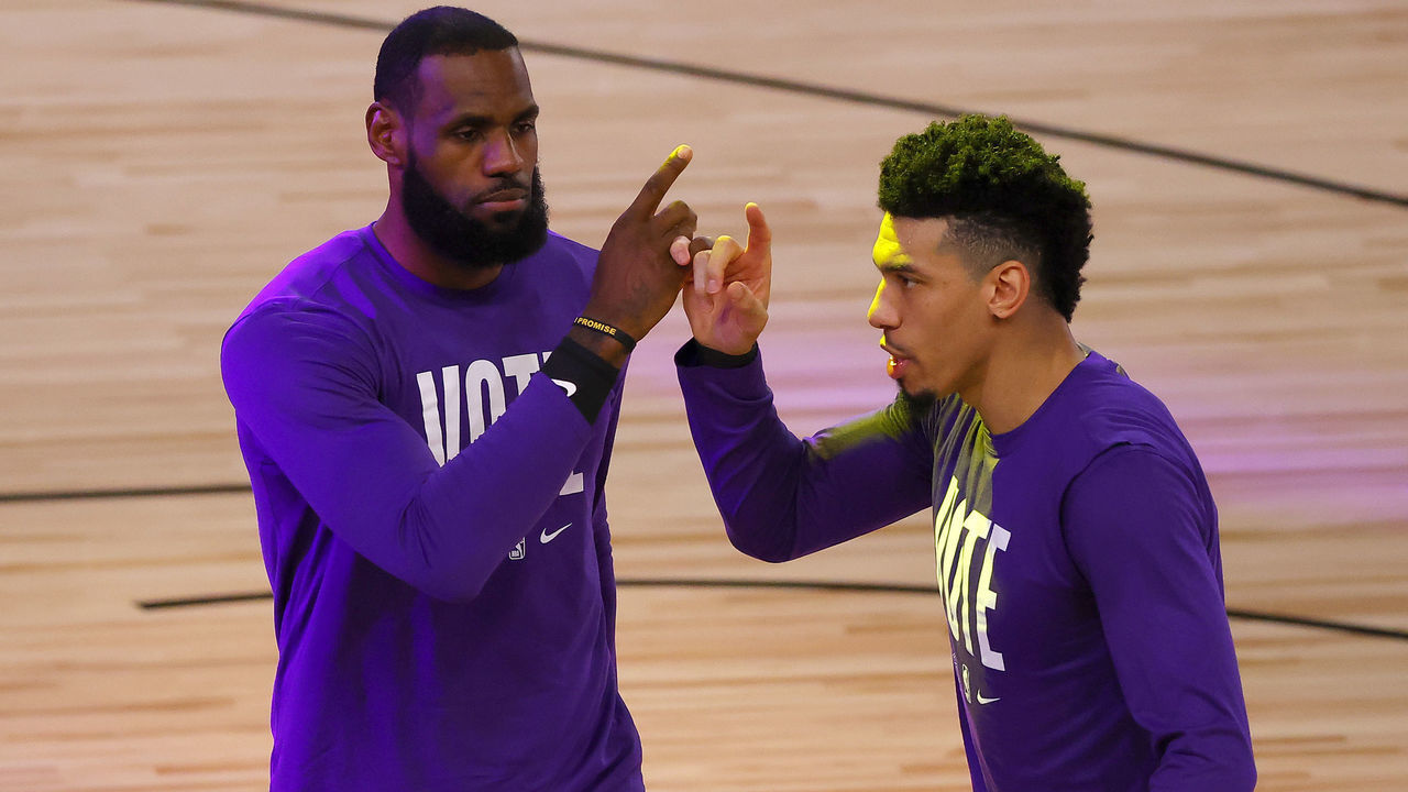 LAKE BUENA VISTA, FLORIDA - OCTOBER 02: LeBron James #23 and Danny Green #14 of the Los Angeles Lakers react before Game Two of the 2020 NBA Finals against the Miami Heat at AdventHealth Arena at ESPN Wide World Of Sports Complex on October 02, 2020 in Lake Buena Vista, Florida.