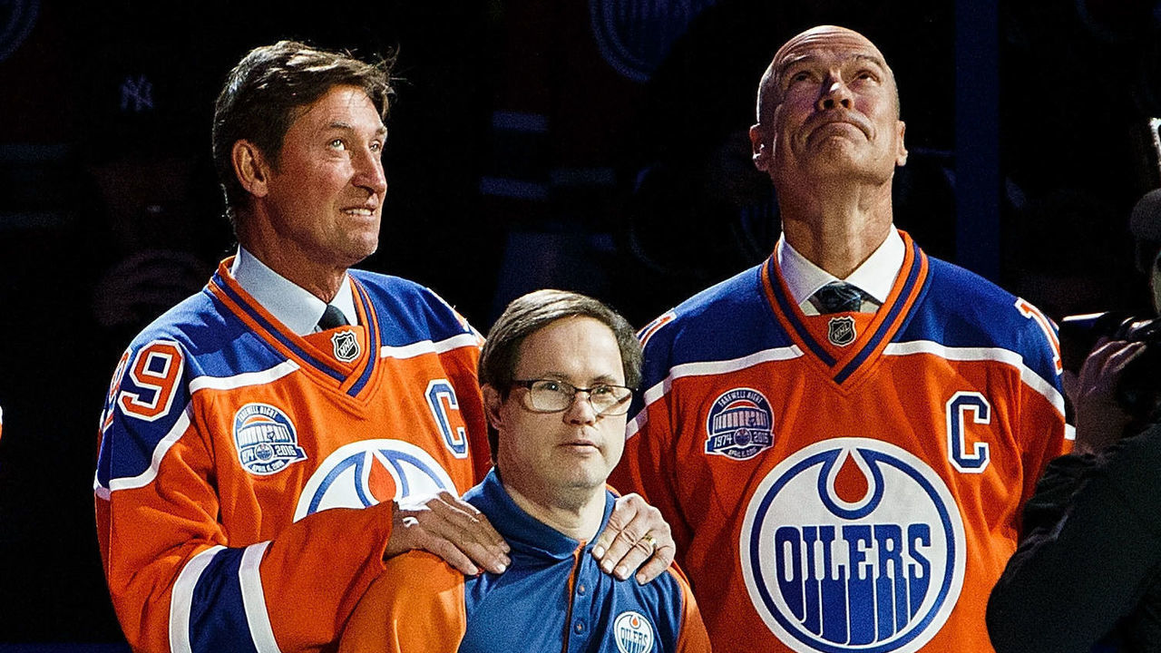 EDMONTON, AB - APRIL 6: (From left) Former Oilers Paul Coffey, Grant Fuhr, Jari Kurri, Wayne Gretzky and Mark Messier along with longtime dressing room attendant Joey Moss watch as a banner is lowered during the closing ceremonies at Rexall Place following the game between the Edmonton Oilers and the Vancouver Canucks on April 6, 2016 at Rexall Place in Edmonton, Alberta, Canada. The game was the final game the Oilers played at Rexall Place before moving to Rogers Place next season.