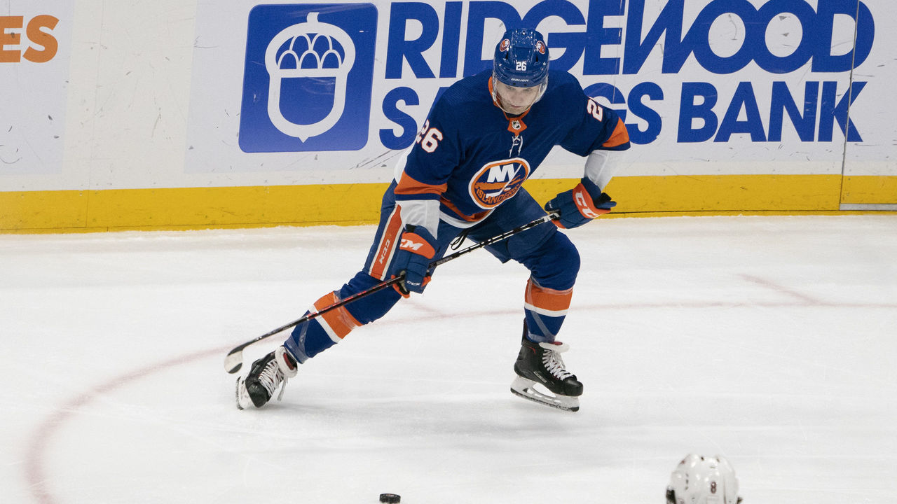 UNIONDALE, NY - OCTOBER 24: New York Islanders Right Wing Josh Ho-Sang (26) looks to take a shot on goal during the first period of the National Hockey Le3ague game between the Arizona Coyotes and the New York Islanders on October 24,2019, at the Nassau Veterans Memorial Coliseum in Uniondale, NY.