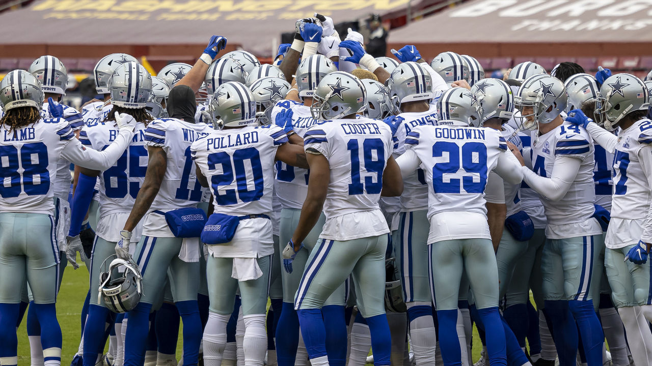LANDOVER, MD - OCTOBER 25: Dallas Cowboys players huddle before the game against the Washington Football Team at FedExField on October 25, 2020 in Landover, Maryland.